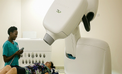 CyberKnife with patient and radiotherapist