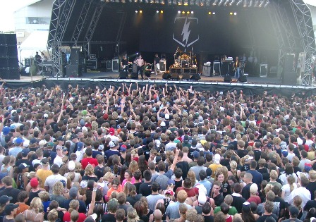 Crowd looking toward the stage at a rock concert